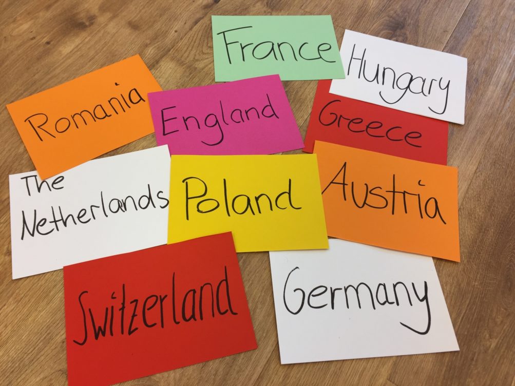 The names of the participating countries written on cards